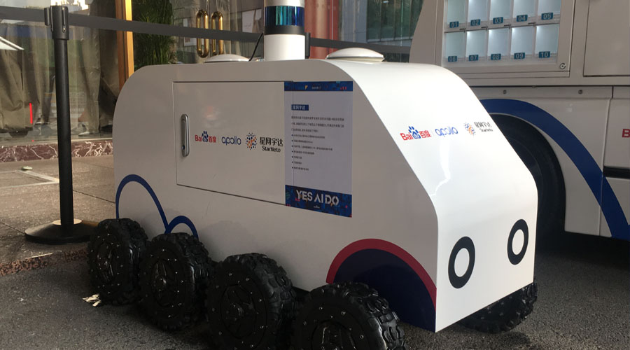 尊龙抖圈官网无人配送车亮相百度天下大会